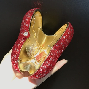 Sparkling red heart-shaped evening clutch bag with rhinestones and gold chain strap
