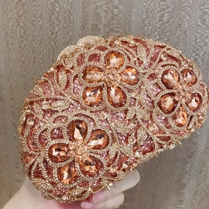 Luxury rose gold evening clutch bag with sparkling crystals and floral diamond patterns