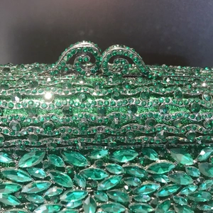 Luxury green rhinestone dinner clutch bag with sparkling diamond-encrusted metal clasps