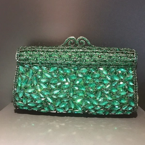 Close-up of green rhinestone evening bag with marquise crystals and vintage metal clasp