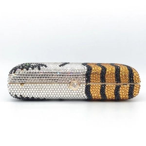 Luxe capsule evening clutch featuring crystal rhinestones and stylish tiger pattern motif