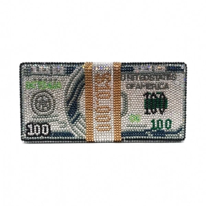 Close-up of a handmade crystal dollar clutch bag with detailed rhinestone currency patterns