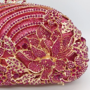 Luxurious hollow rose red rhinestone evening clutch bag with golden floral metal patterns