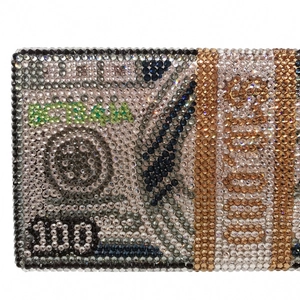 Macro shot of high-quality crystal rhinestones forming a stack of hundred dollar bills