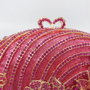 Elegant rose red rhinestone evening clutch bag with glitter finish and heart clasp