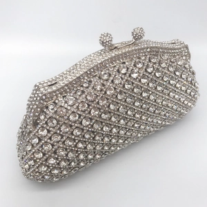 Elegant silver rhinestone evening clutch bag with crystal-encrusted metal frame and clasp
