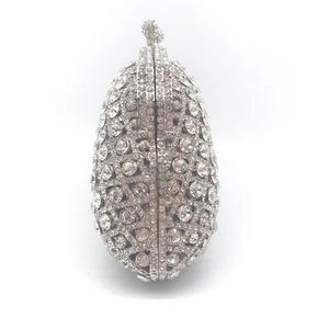 Elegant silver oval dinner clutch fully encrusted with rhinestones and a jeweled clasp