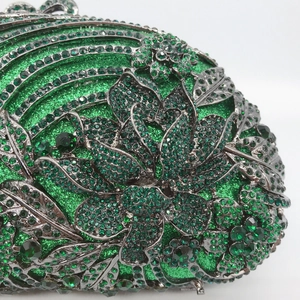 Luxury green emerald rhinestone evening clutch bag with ornate floral crystal patterns