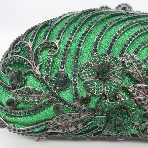 Green rhinestone evening clutch bag with intricate metal hollow flower and sequin detailing
