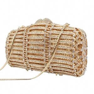 Golden hollow metal clutch bag with sparkling diamonds and a detachable chain strap