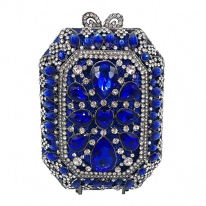 Pochette da sera blu reale con strass di cristallo e chiusura a fiocco