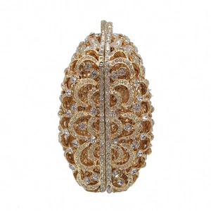 Detailed view of the gold hollow-out metal frame and sparkling crystal rhinestones