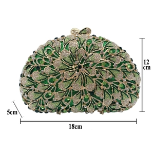 Detailed size view of green rhinestone evening clutch showing 18cm length and floral pattern