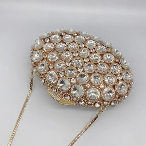 Elegant hollow metal evening clutch bag with full sparkling rhinestones and gold chain