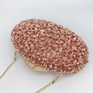 Elegant oval dinner clutch bag with sparkling champagne rhinestones and gold chain strap