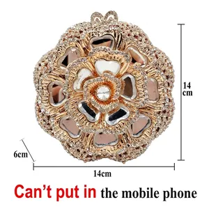 Golden rose-shaped evening clutch bag with sparkling rhinestones and crystal stones