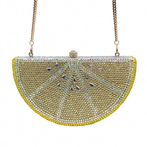 Luxury lemon-shaped evening clutch bag with yellow crystals and golden chain strap