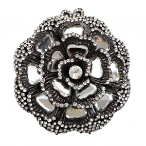 Detailed view of rose floral evening clutch with crystal rhinestones and centered gems