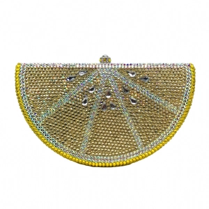 Sparkling lemon slice evening clutch bag featuring yellow and silver crystals with metal clasp