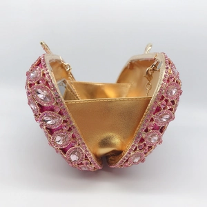 Pink rhinestone heart evening clutch with gold metal frame and chain strap