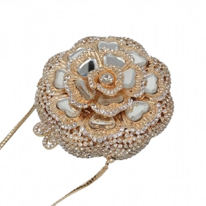 Detailed macro view of the sparkling rose blossom evening bag with crystal rhinestones