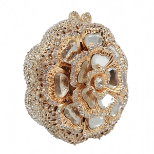 Close-up of flower shaped evening bag featuring sparkling crystals and rhinestones