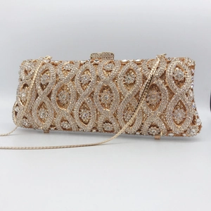 Luxury gold evening clutch bag with sparkling rhinestone mesh and a fine metal chain strap