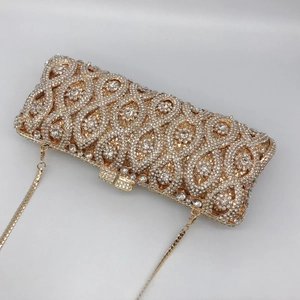 Gold metal evening clutch bag with sparkling rhinestones and detachable shoulder chain