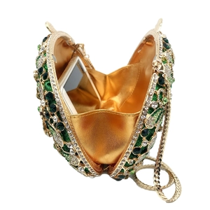 Luxurious evening clutch interior showing space for a smartphone with golden chain
