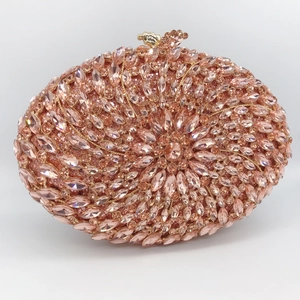Elegant rose gold oval evening clutch bag with sparkling marquise crystals for formal gala