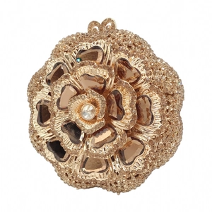 Detailed view of rose shaped metal evening clutch with champagne and brown crystals