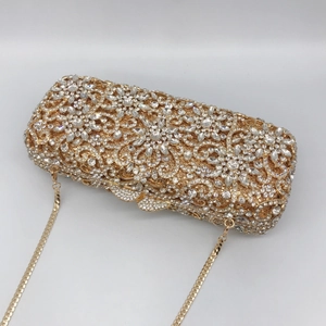 Luxurious hollow gold metal evening clutch bag with sparkling diamond floral patterns