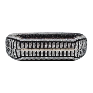 Elegant clutch bag with black and white rhinestones in a geometric pattern and silver frame