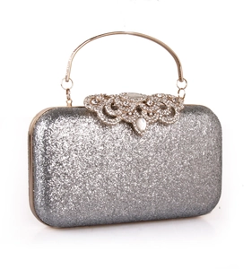 Elegant silver sequin evening clutch bag with crystal handles and sparkling finish