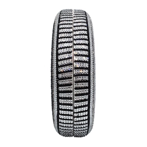 Detailed view of the luxury striped evening clutch featuring black and silver rhinestones