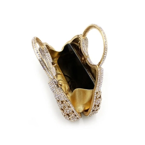 Golden rhinestone evening clutch bag with chain strap showing internal space for a phone