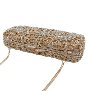 Luxury gold hollow metal evening clutch bag with sparkling crystals and a chain strap