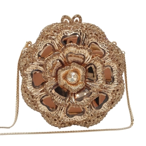 Exquisite hollow floral evening bag with sparkling rhinestones and gemstone inlays
