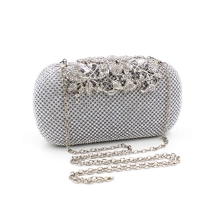 Exquisite silver crystal clutch bag featuring a detailed hollow floral metal top clasp