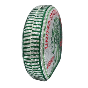 Detail view of round US dollar coin clutch bag with green and silver rhinestones