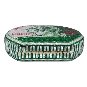 Macro detail of crystal evening clutch bag featuring a hundred yuan banknote design