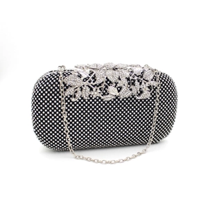 Luxurious evening clutch bag with black crystals, silver leaf clasp and metal chain