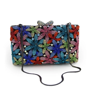 Detail of floral crystal evening clutch with colorful rhinestones and butterfly clasp