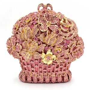 Elegant flower basket evening bag with pink crystals and golden metal hollow design
