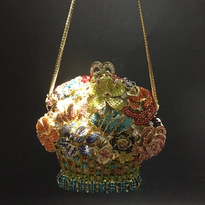 Detailed view of colorful rhinestones on flower basket shaped luxury evening clutch