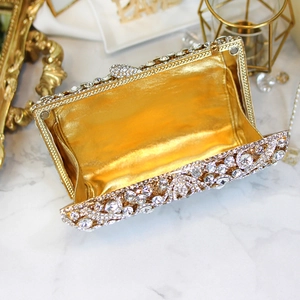 Detail view of the luxury crystal evening bag with golden satin lining and magnetic closure