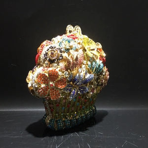 Exquisite hollowed metal flower basket evening bag with multicolored crystal rhinestones