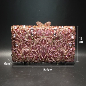 Macro view of pink rhinestone evening clutch with dimensions 18.5x11x5 cm