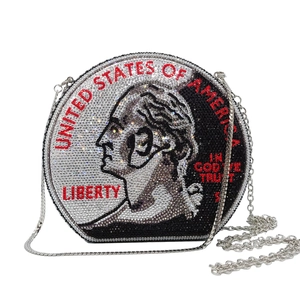 Detail of the US dollar coin design with sparkling rhinestones on the round evening bag