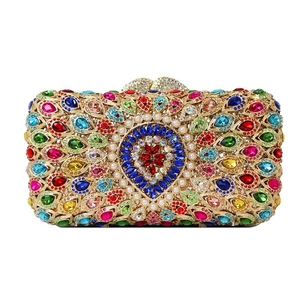 Hollow metal evening clutch bag with multicolored rhinestones and pearl embellishments